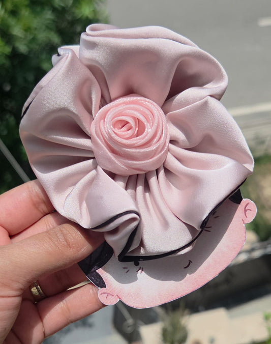 Blush pink and champagne beige satin rosette flower hair clips with alligator backs.