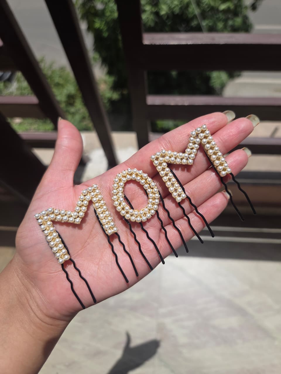 Pearl MOM hair comb pin on gold wire held in hand – elegant baby shower hair accessory gift
