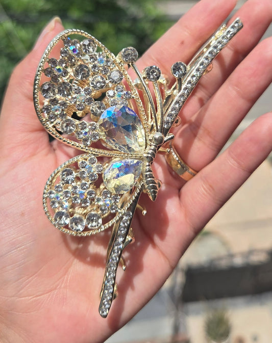 Elegant crystal butterfly metal hair claw clip for women, sold individually.