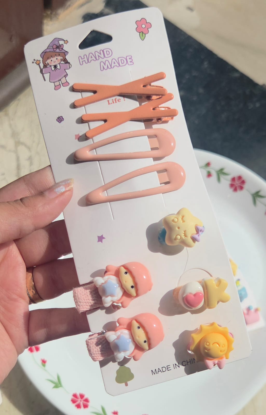 Peach orange aesthetic snap hair clips set with sun and character details for girls.