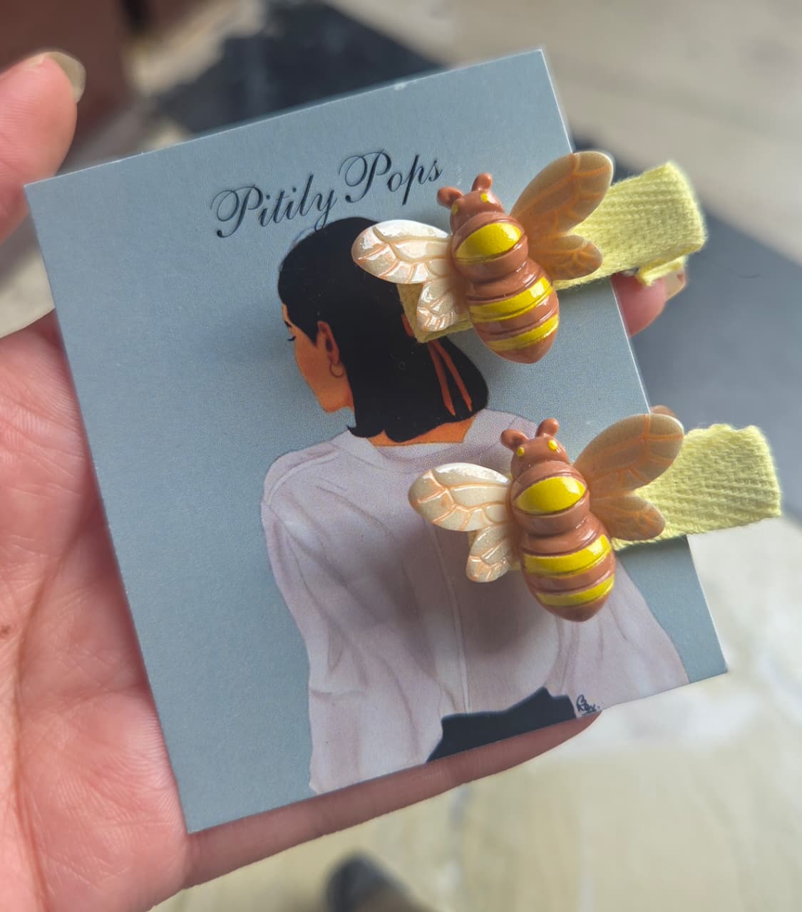 Handmade Pitily Pops brand kids hair clips in cute bee and honey shapes organized as matching pairs