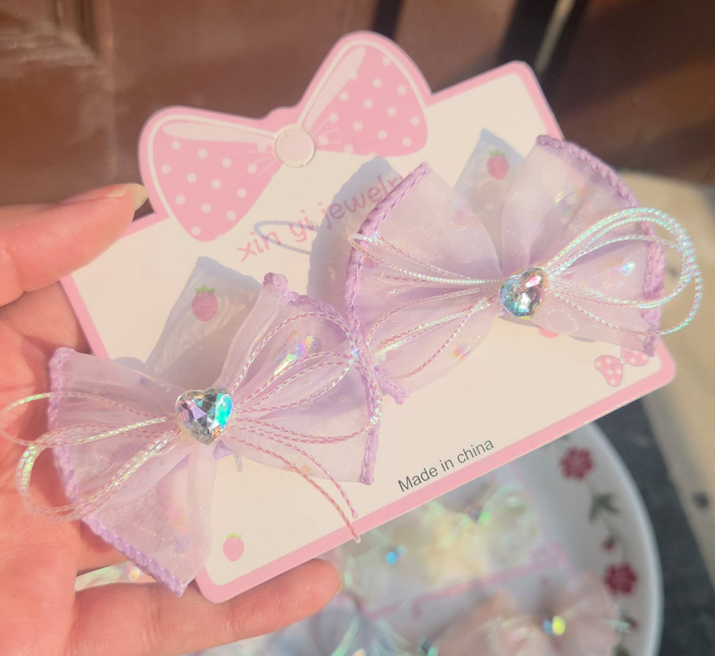 Pair of soft lavender sheer mesh hair bow clips for toddlers and girls' pigtails.