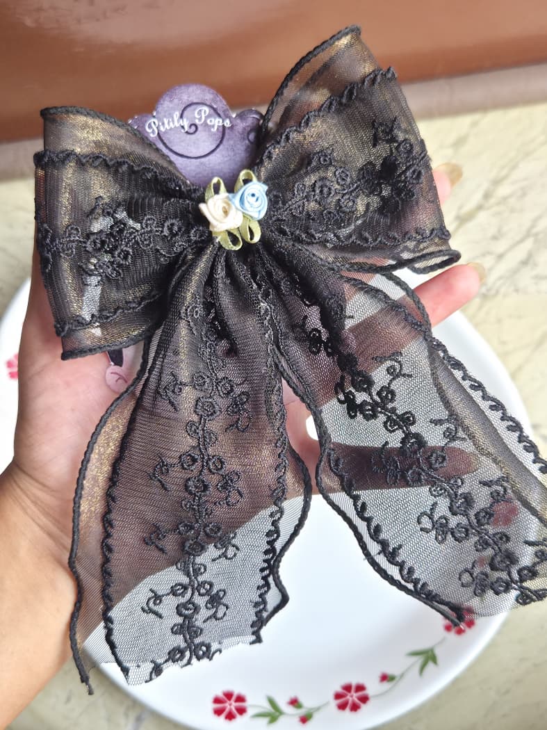 Black lace floral embroidered hair bow clip with light blue mini satin rose detail
