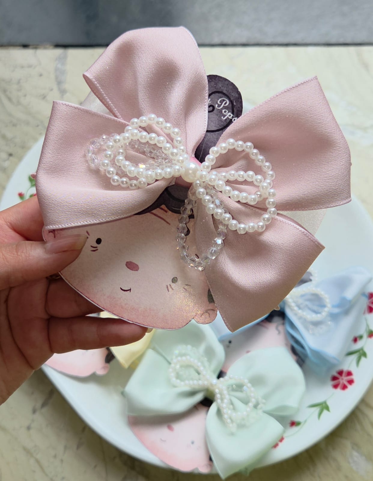 Blush pink satin hair bow clip with pearl beaded overlay and alligator clasp back