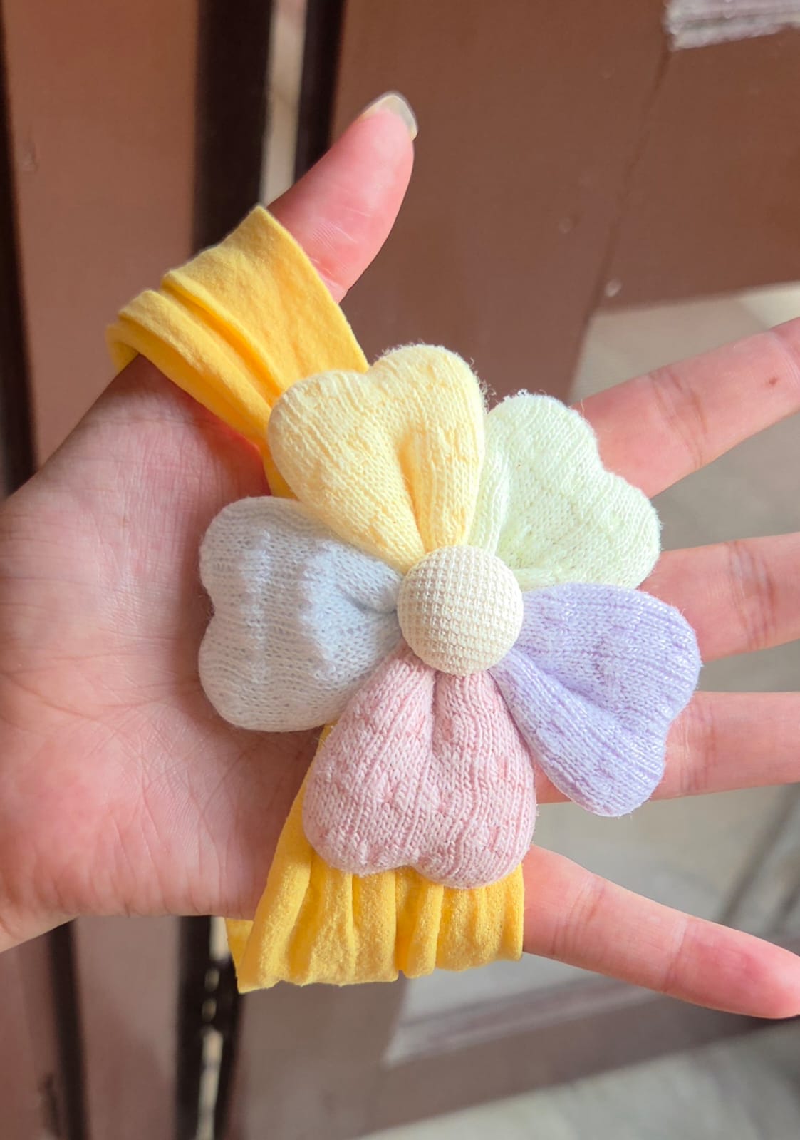    Mustard yellow soft nylon baby headband with plush floral accessory