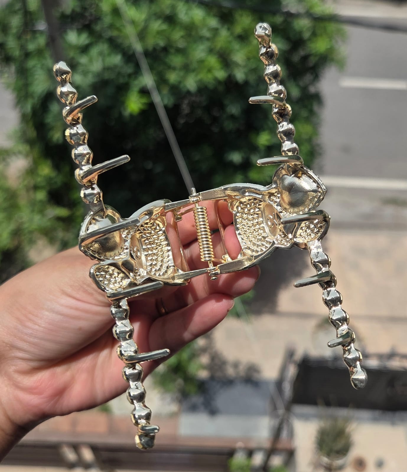 Luxury Y2K style rhinestone teddy bear metal hair claw clip in high-shine gold finish.