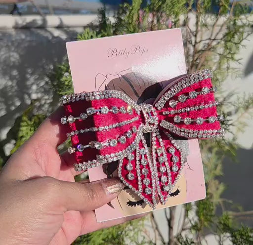 Luxury handmade red rhinestone hair bow clip with sparkling crystal detailing and buckle closure for women and girls