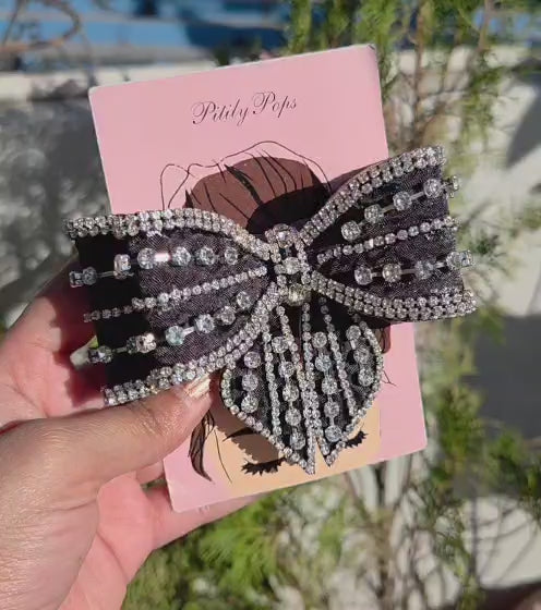 Handmade black crystal bow hair clip with sparkling rhinestone embellishments for women and girls